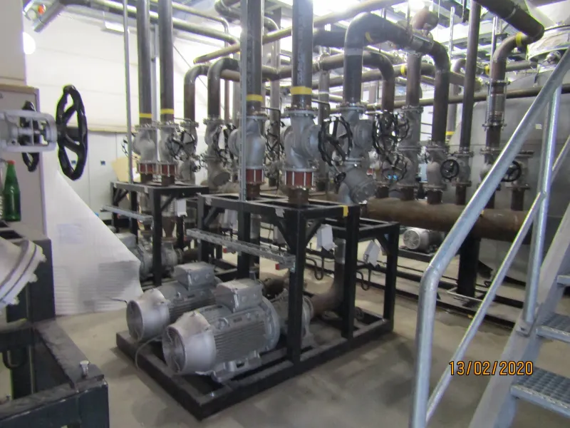 Pump skids with motors, valves and access stairs