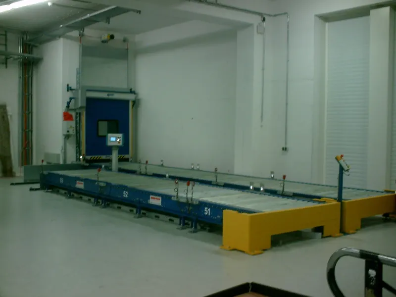 Conveyor with yellow end stop