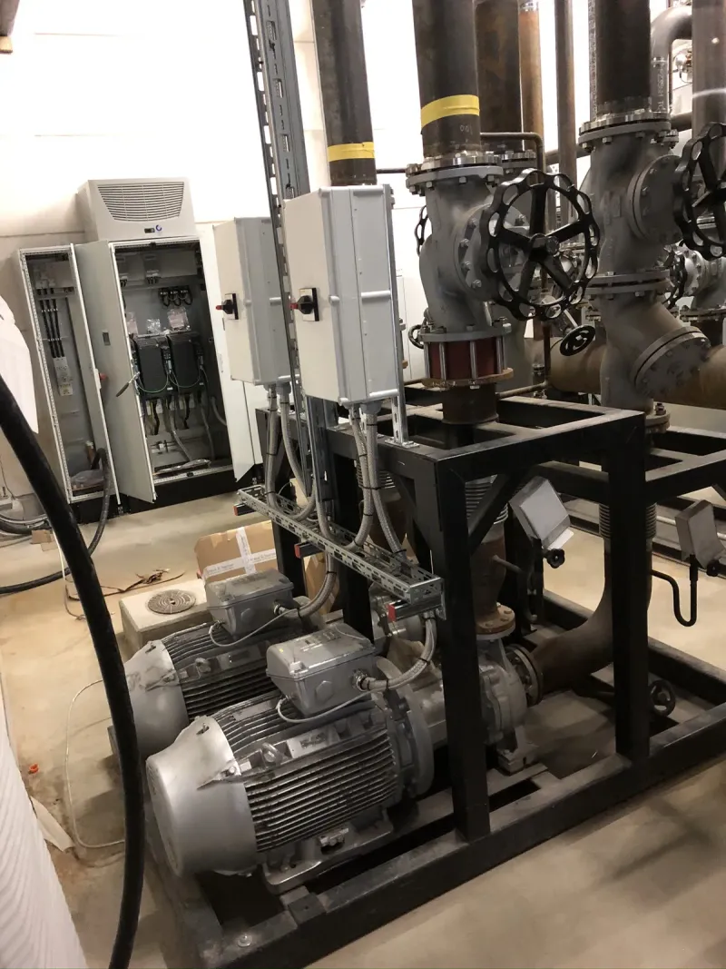 Pump skid with the new cabinet behind