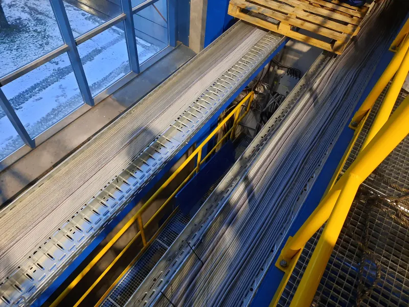 Cable trays along the conveyors