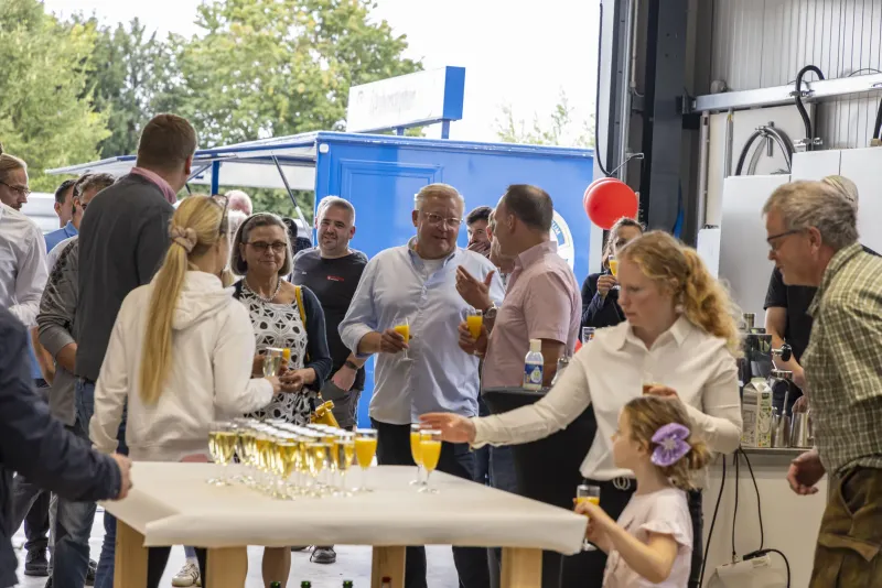 A toast with sparkling wine and orange juice