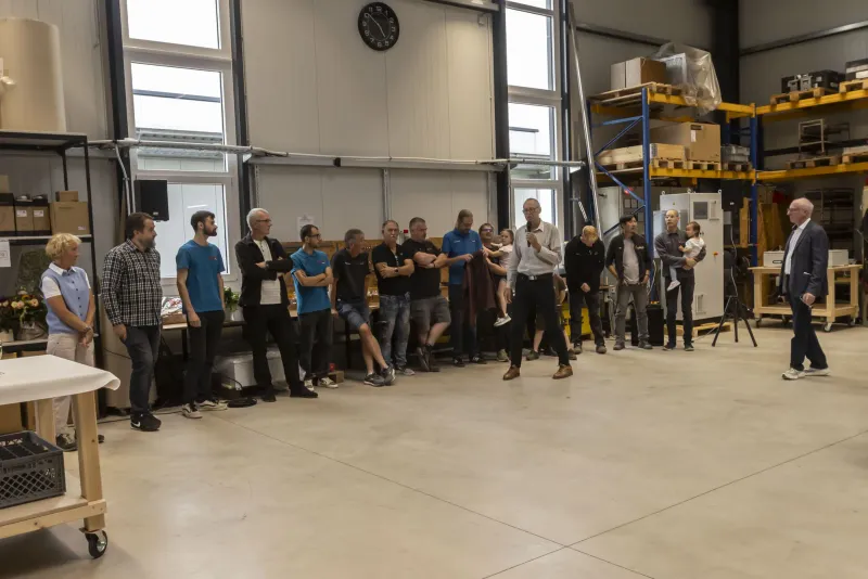 The team in the new hall