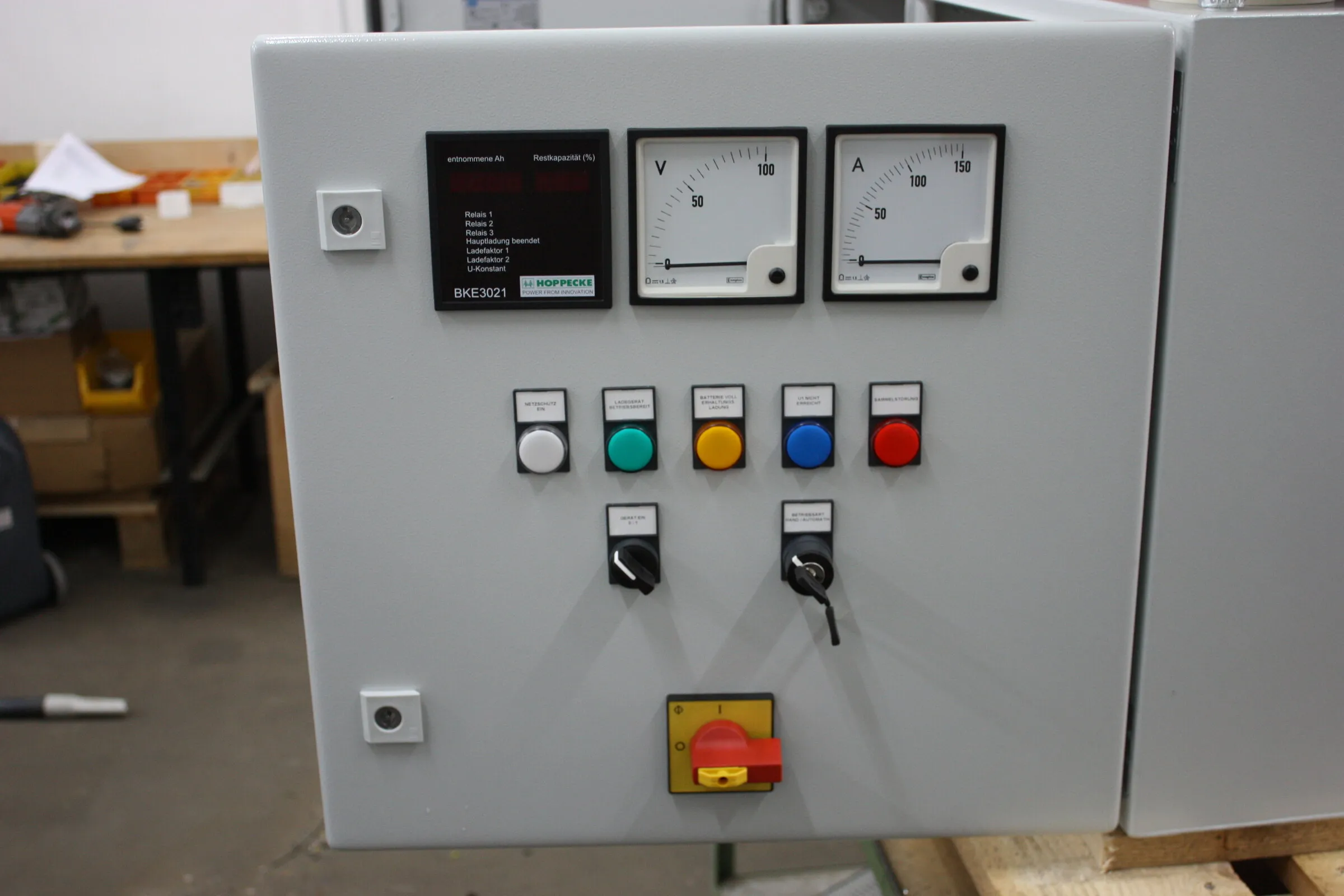 Charger control panel with volt and amp meters, indicator lamps and key switch